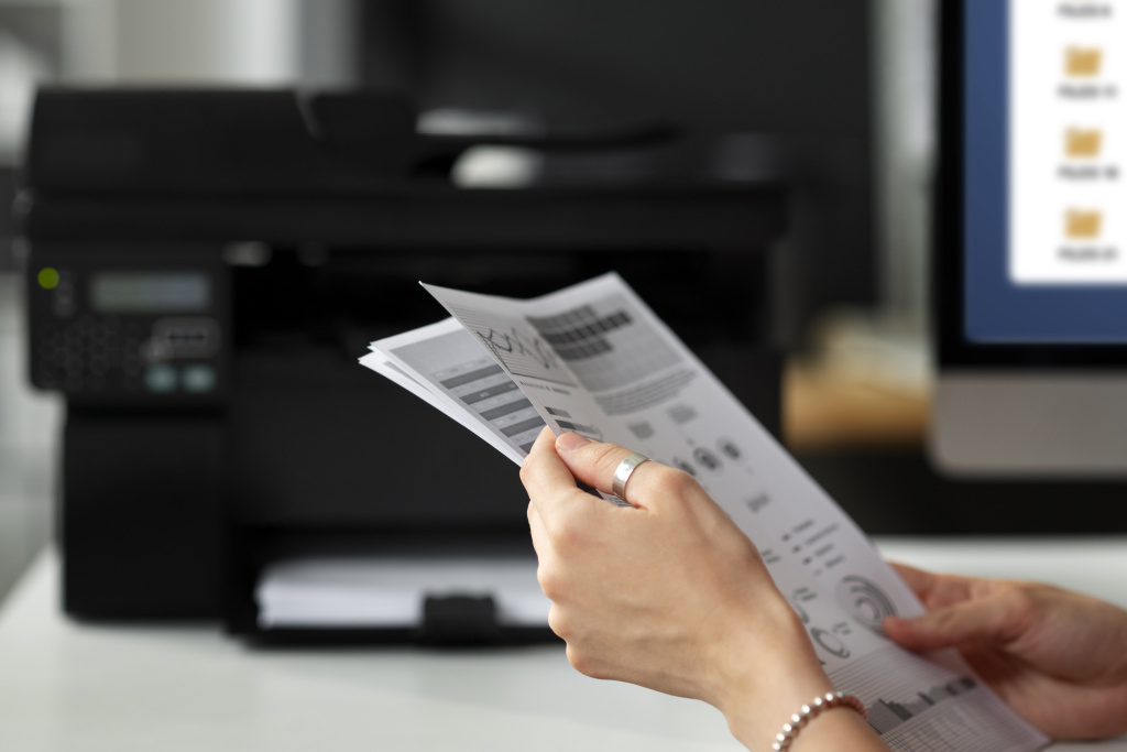 side-view-woman-holding-paper.jpg side-view-woman-holding-paper.jpg